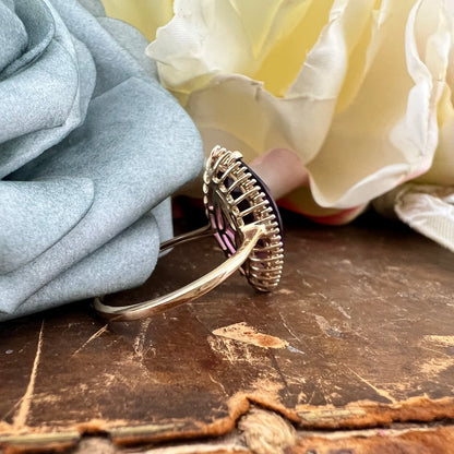 Anello con ametista marquise e diamanti a baguette