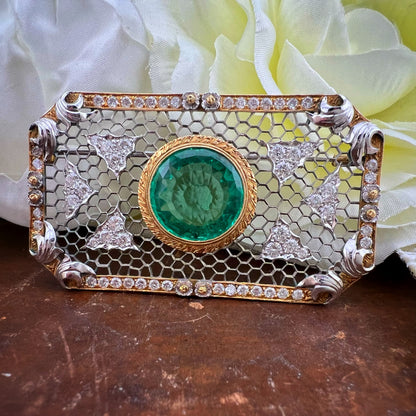 Rara e importante spilla Art Déco con smeraldo colombiano da 7 carati