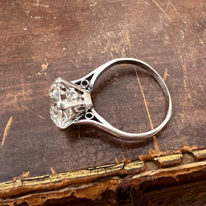 Anello solitario in oro 18k con diamante da 3.90 ct.