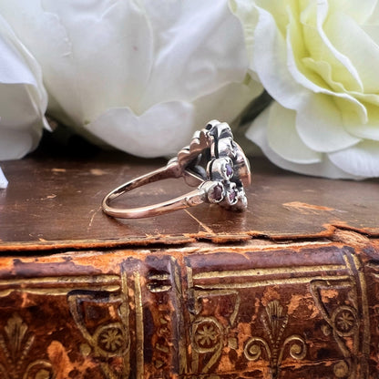 Anello belle époque in oro, argento, tormalina e rubini