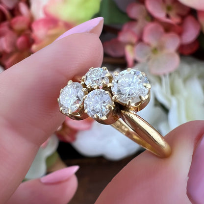 Anello vintage a quattro diamanti in oro giallo 18 carati