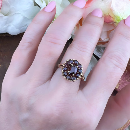 Anello vintage a margherita con granati – Londra, 1986