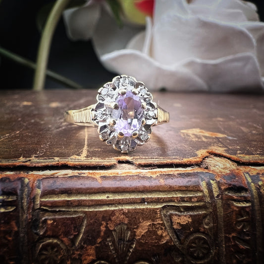 Anello margherita in oro con ametista e diamanti