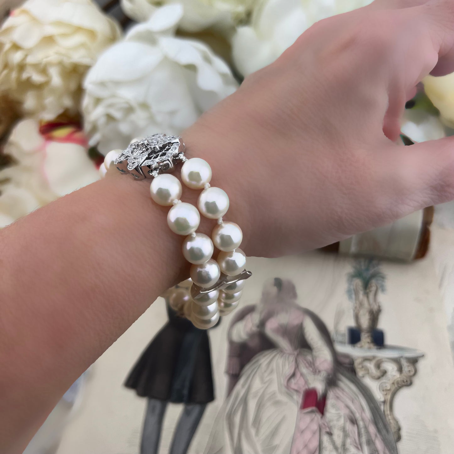 Bracciale vintage in perle Akoya con chiusura importante in oro bianco e diamanti – Anni ’60