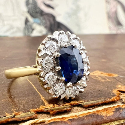 Anello margherita con zaffiro e diamanti old mine – oro giallo 18 k