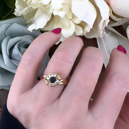 Anello con zaffiro e diamanti in oro giallo 14 ct