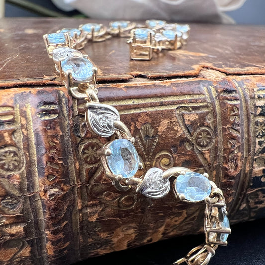 Bracciale vintage in oro giallo con topazi azzurri e diamanti