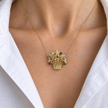 Ciondolo a cestello fiorito in oro 18 k con pietre preziose – Italia, 1948-1968