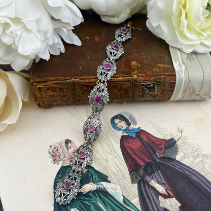 Bracciale con rubini e diamanti a rosetta in oro 18 ct e argento