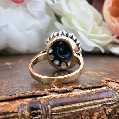 Grande anello margherita con zaffiro teal 3.80 ct e diamanti a rosetta per 1.20-1.30 ct in oro giallo 18k