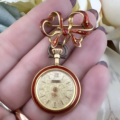 Orologino spilla (brooch watch) in oro 18 k e smalti. Italia 1950