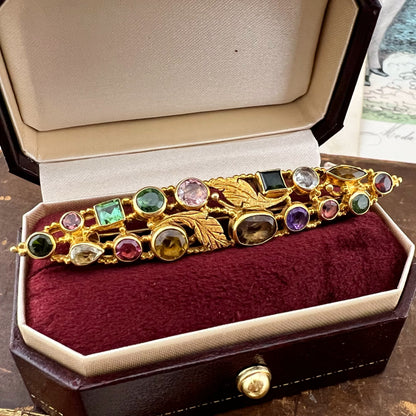 Spilla vintage fiorentina in oro 18 carati con gemme policrome