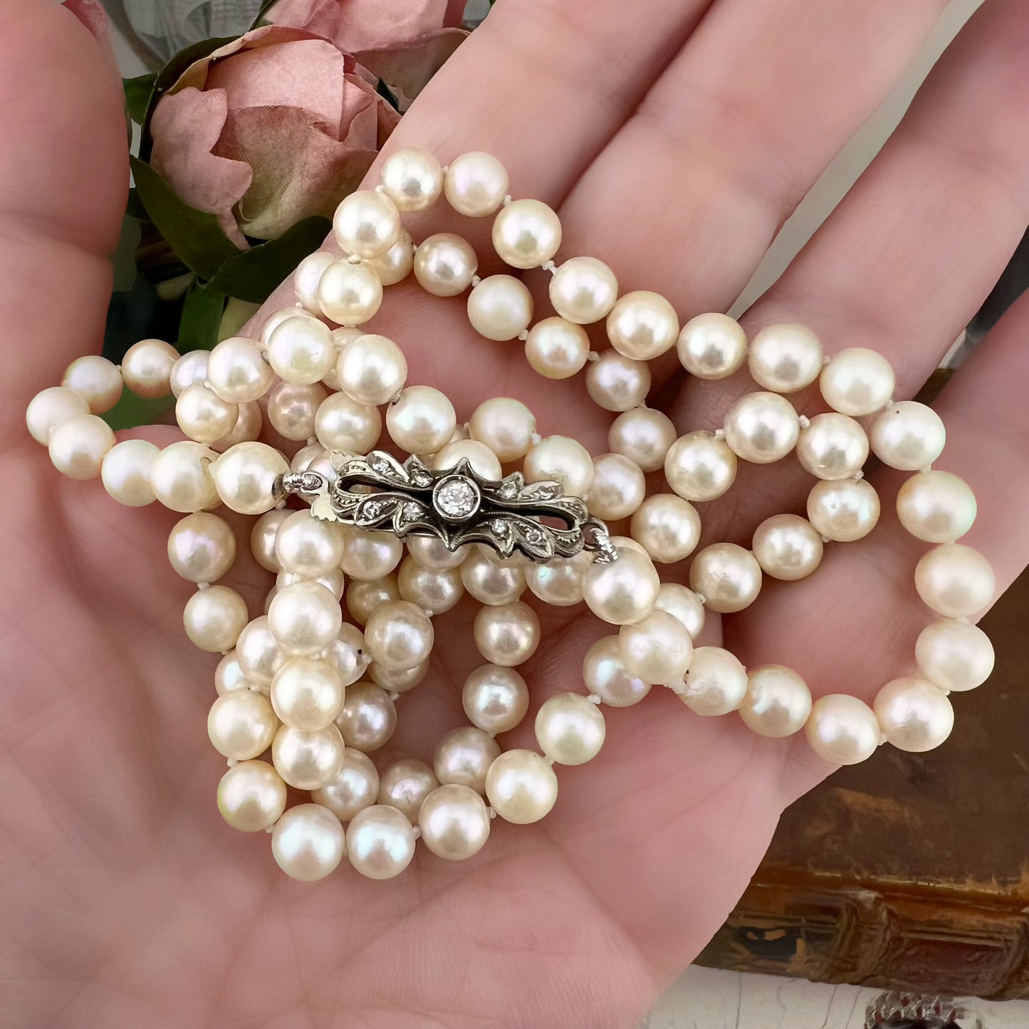 Collana 112 perle akoya, oro e diamanti