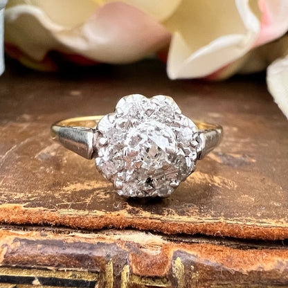 Anello antico “margherita” con diamanti old mine cut oro 18k e platino (anni 1920)