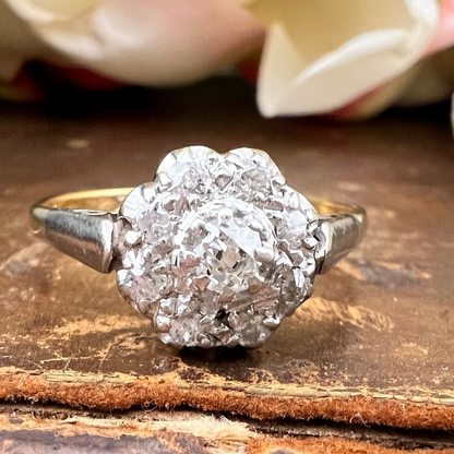 Anello antico “margherita” con diamanti old mine cut oro 18k e platino (anni 1920)
