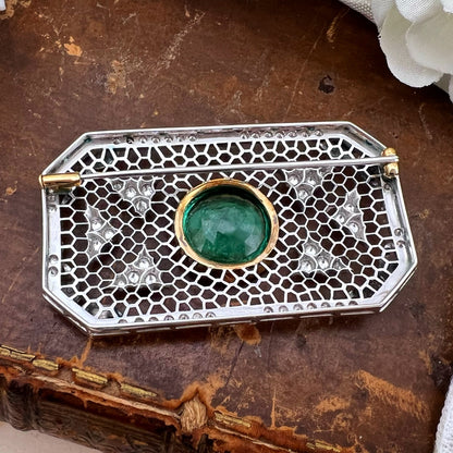 Rara e importante spilla Art Déco con smeraldo colombiano da 7 carati