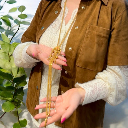 Collana saliscendi in oro con corallo e perline Belle Époque