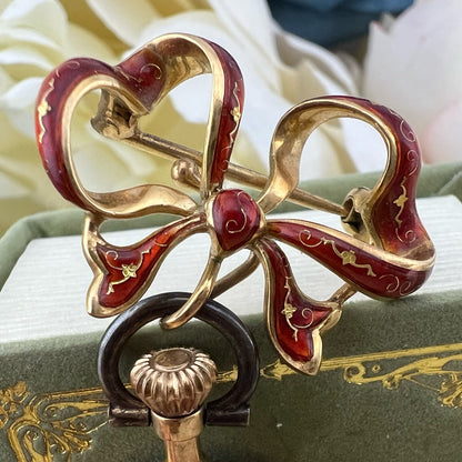 Orologino spilla (brooch watch) in oro 18 k e smalti. Italia 1950