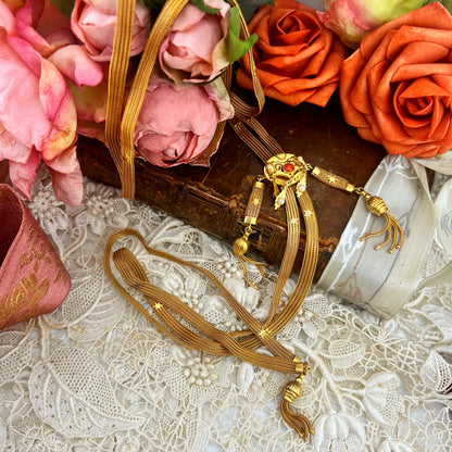 Collana saliscendi in oro con corallo e perline Belle Époque