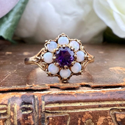 Anello a margherita con ametista e opali