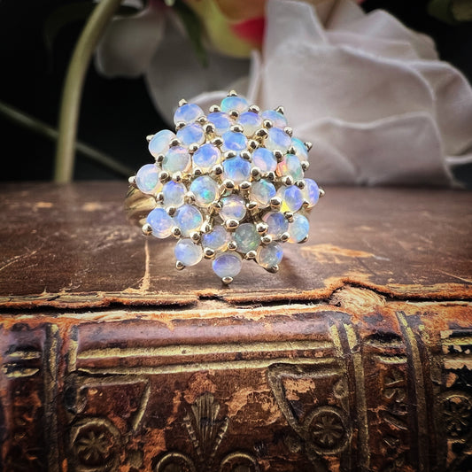 Anello vintage a cupola con opali