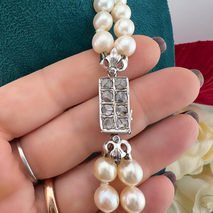 Collana a doppio filo di perle chiusura in oro bianco 18k e diamanti rosa coroné. Italia anni 20