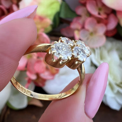 Anello vintage a quattro diamanti in oro giallo 18 carati