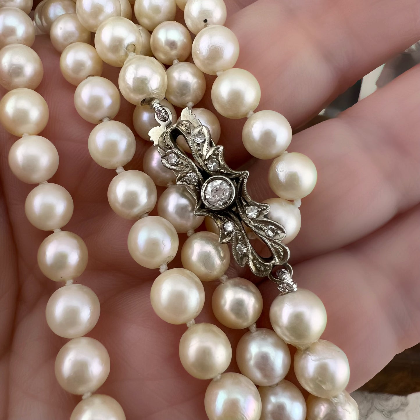 Collana 112 perle akoya, oro e diamanti