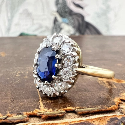 Anello margherita con zaffiro e diamanti old mine – oro giallo 18 k