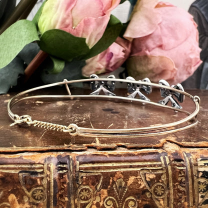 Bracciale vintage in oro 18k con fiocchi di diamanti