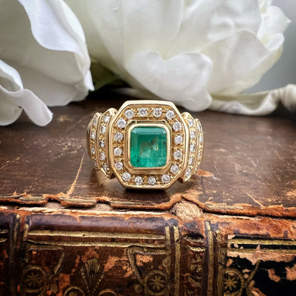 Anello ottagono smeraldo e diamanti oro 18 ct