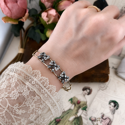 Bracciale vintage in oro 18k con fiocchi di diamanti
