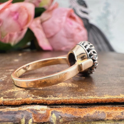 Anello margherita con granato rosato e diamanti, oro 18k – Italia, anni ’40