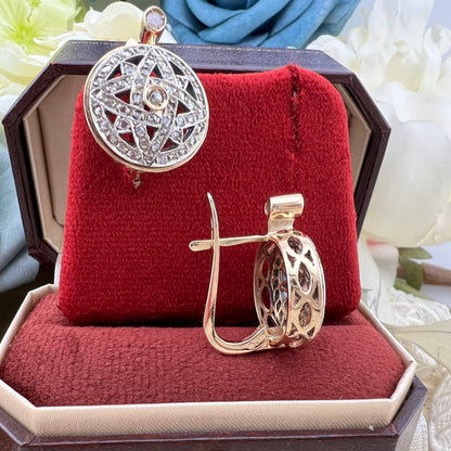 Orecchini a stella ottagramma intrecciata in oro e diamanti