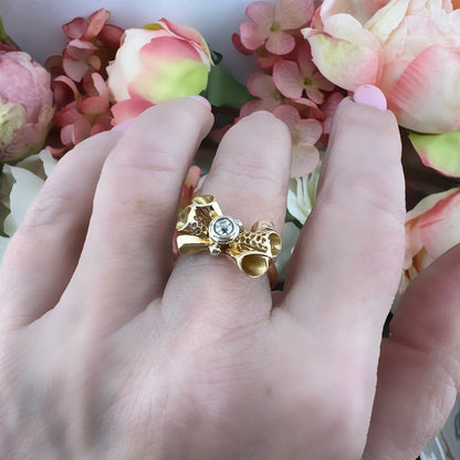 Anello a fiocco pre 1934 in oro 18k e diamante Old Mine