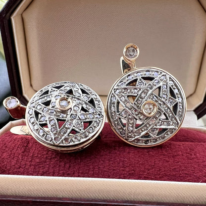 Orecchini a stella ottagramma intrecciata in oro e diamanti