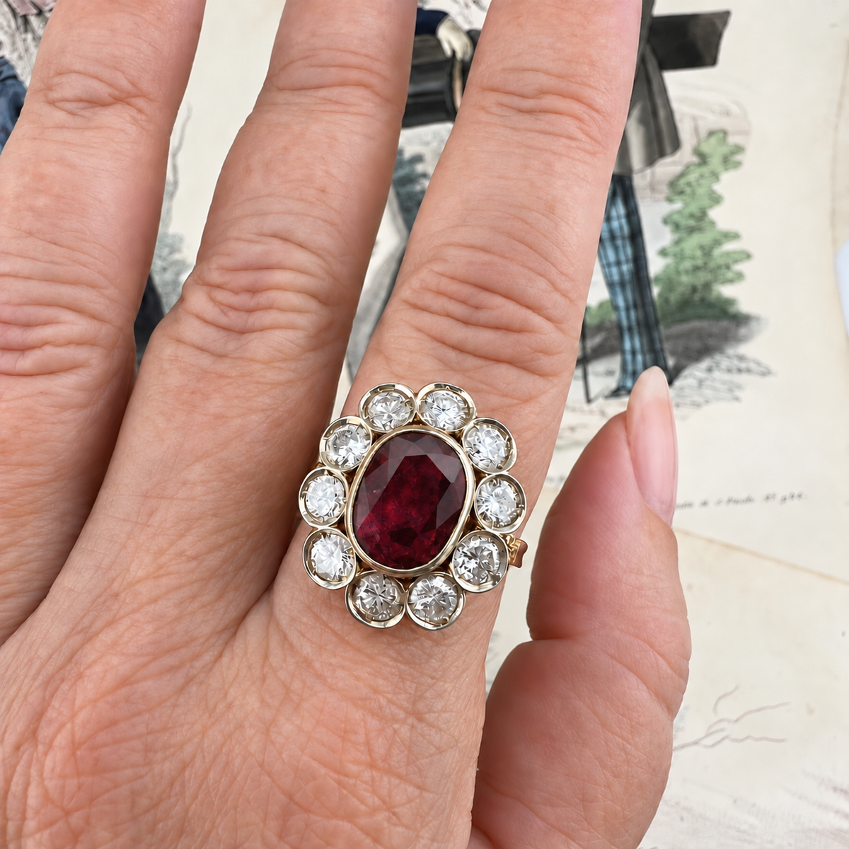 Grande anello a margherita con rubino da 3 ct e diamanti per 2 ct in oro 18k – Italia, anni ’60