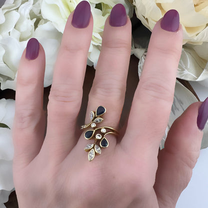 Anello a ramage verticale in oro 18k zaffiri e diamanti
