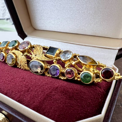 Spilla vintage fiorentina in oro 18 carati con gemme policrome
