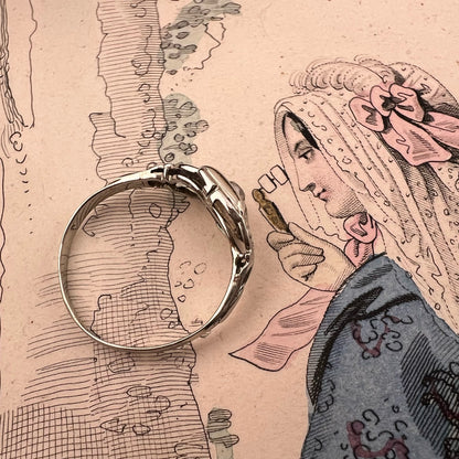 Anello Art Déco con diamante old mine e leucozaffiri